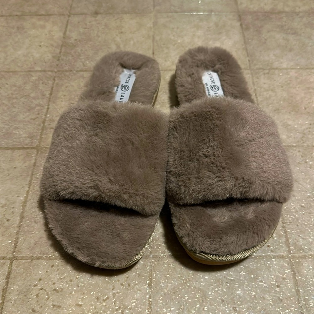 Tan fuzzy slippers